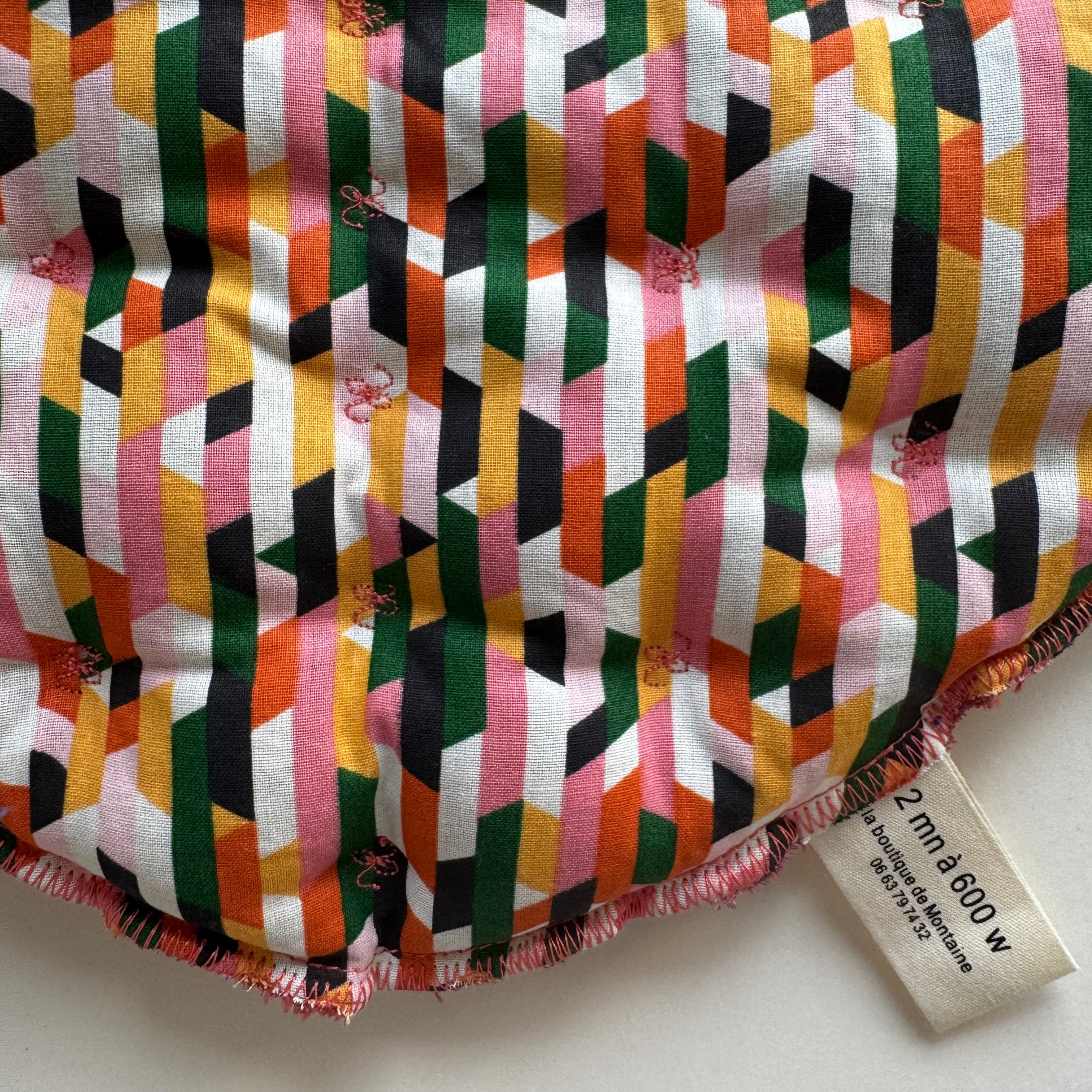 Bouillotte Tour de cou ergonomique grahique brique/ivoire/vert