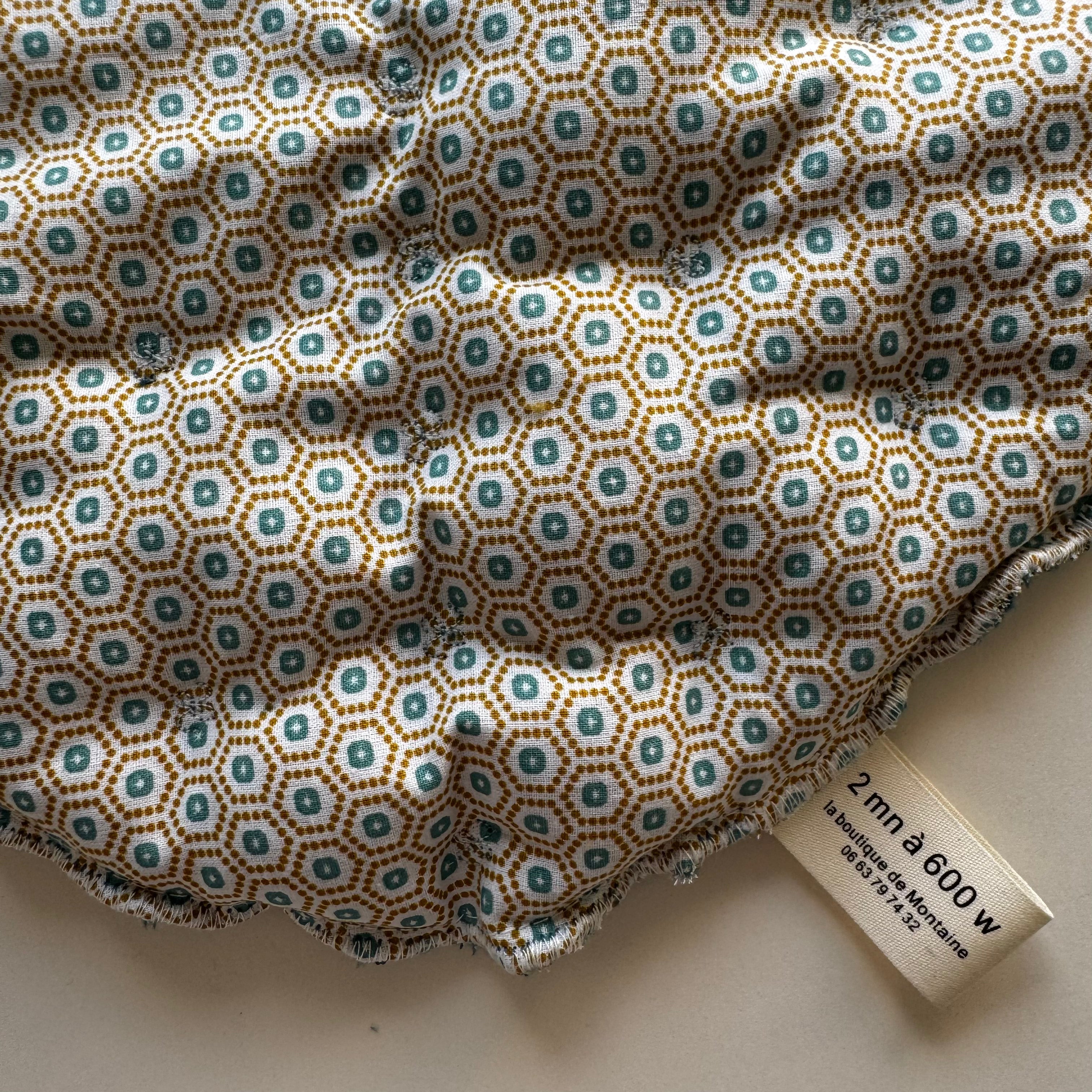 Bouillotte Tour de cou ergonomique graphique bleu canard / ocre