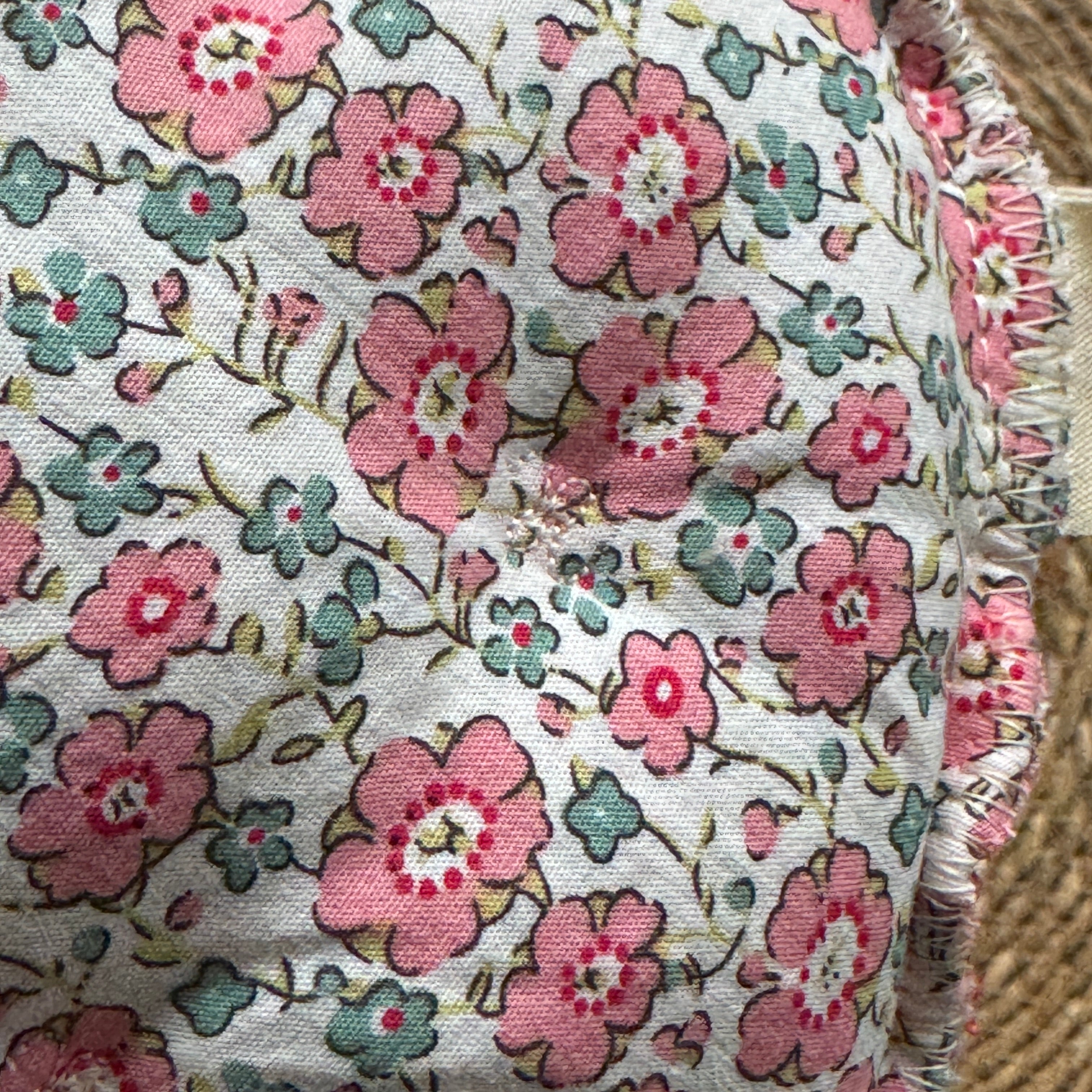 Bouillotte Tour de cou ergonomique fleur rose/orange/corail