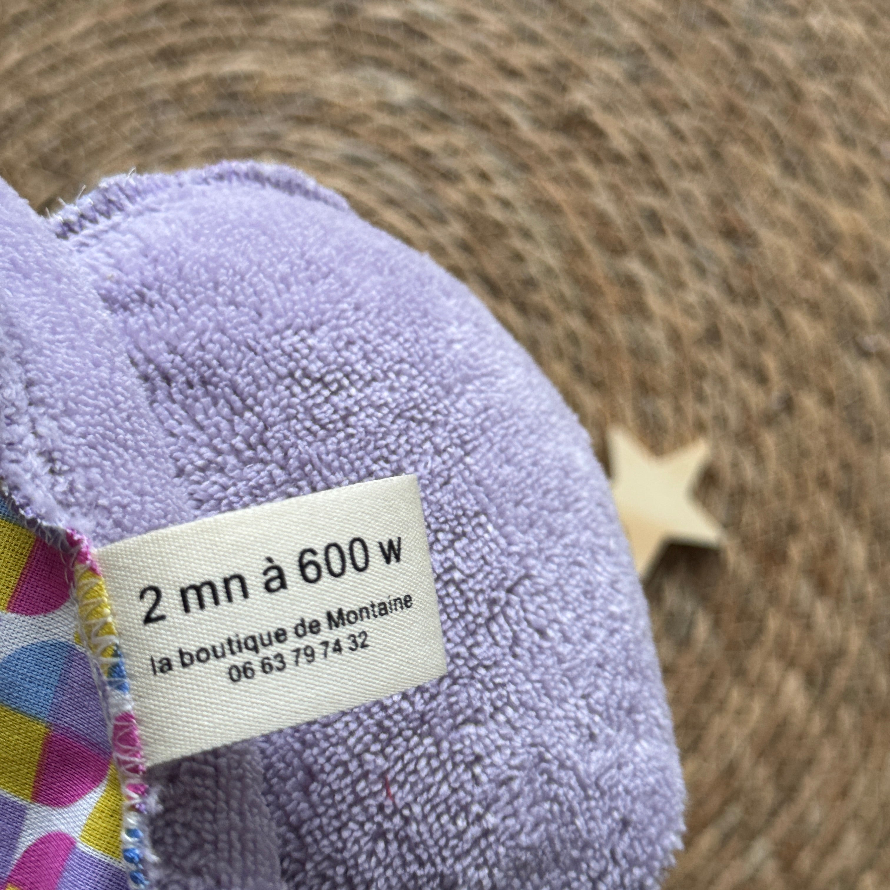 Bouillotte Coeur graphique mauve/jaune/rose/bleu