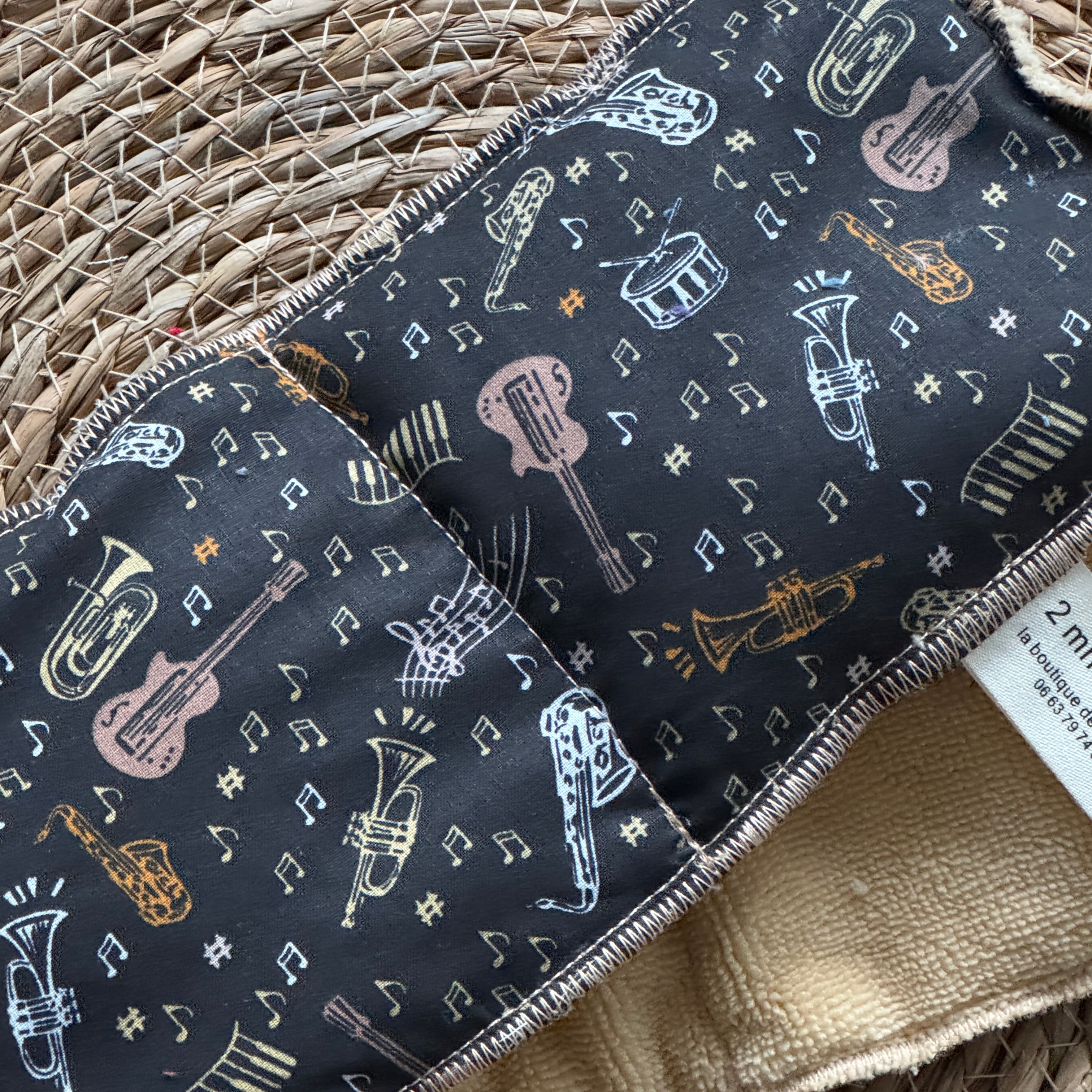 Bouillotte tour de cou rectangle instruments de musique noir/ocre